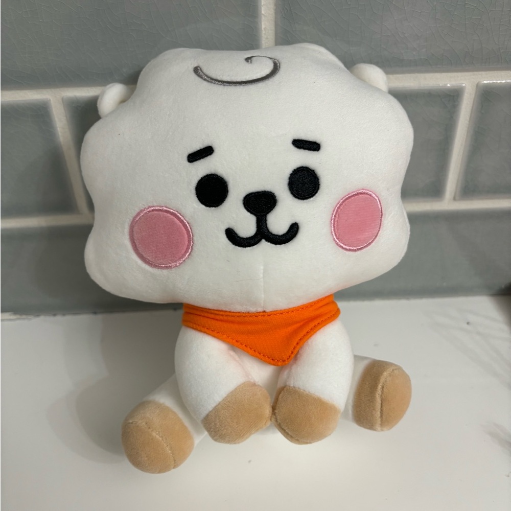 Aurora BT21 RJ Baby sitting plush doll.